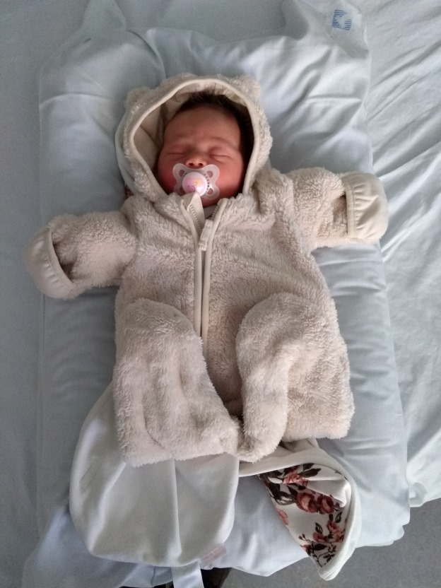 Baby in bear suit